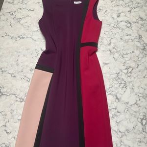 Stretchy, non-wrinkle dress for office or event.